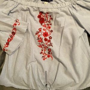 Francesca’s Blue jean off shoulder embroidered top